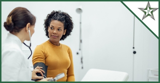 Woman looking at doctor