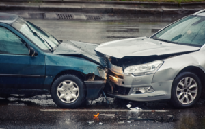 Car front end Collision in the rain